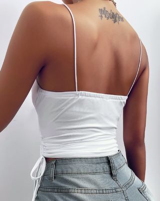 Chiếc áo giáp màu trắng đẹp và chặt chẽ, áo khoác V cổ sâu, áo khoác kéo dây thừng, áo vest nhỏ