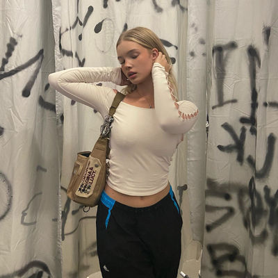Phụ nữ mặt sexy áo thun chặt Slim đường phố đường rỗng ra áo thun tay dài